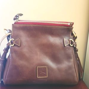 Brown Like New Dooney Bourke Bag. It has hardly been used.